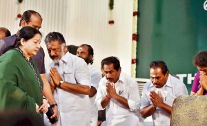 Chennai: AIADMK supremo J Jayalalithaa is greeted by O Panneerselvam and other party leaders after she took oath as Chief Minister of Tamil Nadu during a swearing-in ceremony at Madras University Centenary Auditorium in Chennai on Saturday. PTI Photo by R Senthil Kumar (PTI5_23_2015_000039A)